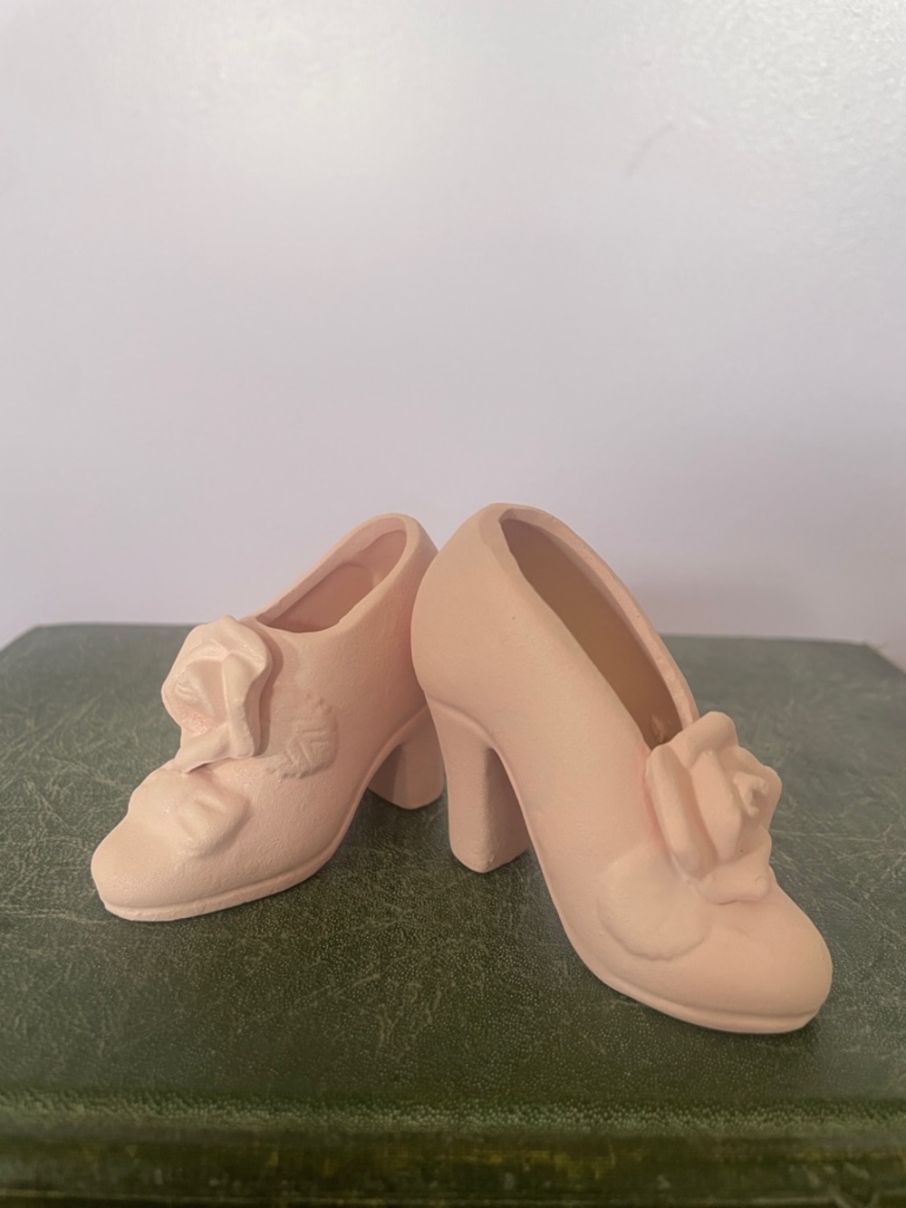 Miniature pink ceramic shoe figurines